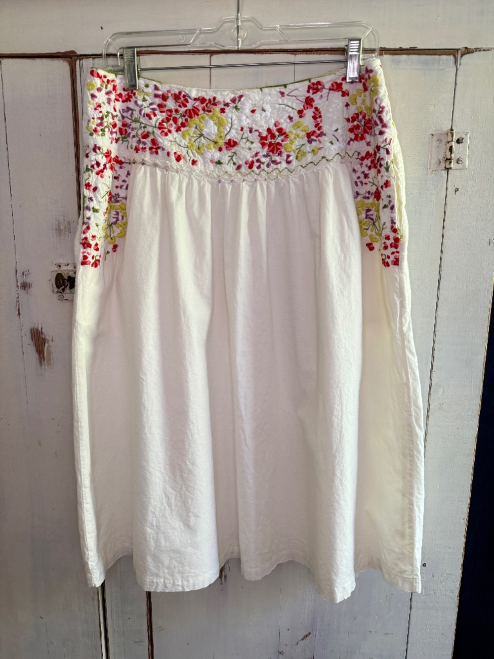 H&M a-line white skirt with embroidered flowers. Size US 14